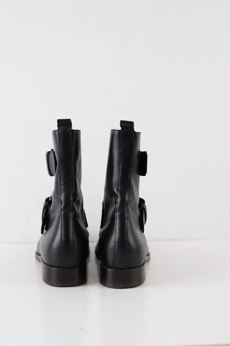 Boots à boucles Michel Vivien noires en cuir, taille 39,5, talons de 2,5cm, tige de 21,5cm, collection femme, en très bon état.